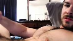 Sexy guy cums on his hairy chest