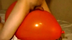 Big inflatable orange balloon humping cum