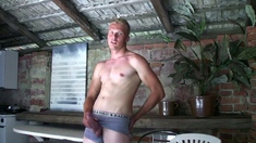 Handsome blonde boy David Robinson jerks his big dick
