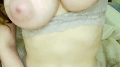Glamour babe with big boobs masturbates in lingerie